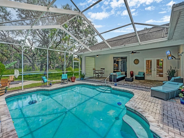 8711 Crescent Forest Blvd, New Port Richey, FL 34654 - swimming pool with french doors, a patio, a ceiling fan, and a lanai