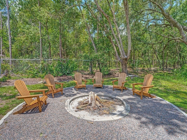 8711 Crescent Forest Blvd, New Port Richey, FL 34654 - view of patio with a fire pit