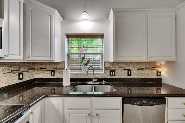 9041 58th St N, Pinellas Park, FL 33782 - kitchen with dishwasher, decorative backsplash, white cabinetry, and dark stone counters