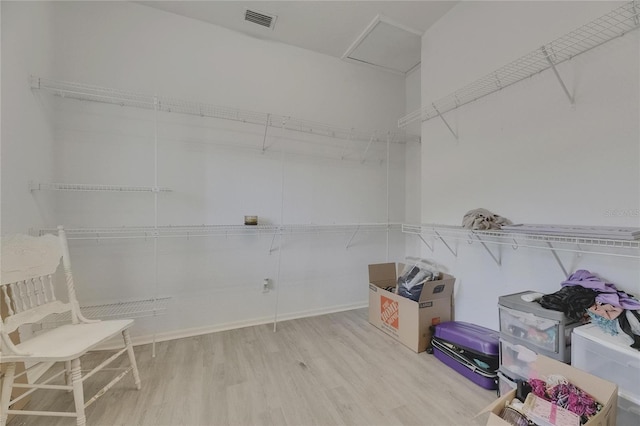 9041 58th St N, Pinellas Park, FL 33782 - spacious closet with wood finished floors