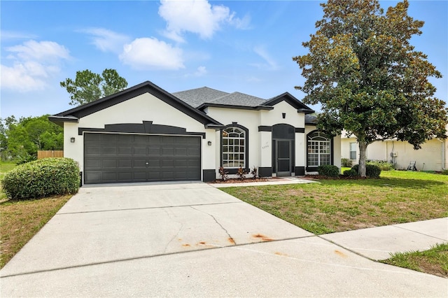 5390 Greystone Dr, Spring Hill, FL 34609 - french provincial home featuring stucco siding, a front lawn, a garage, and concrete driveway