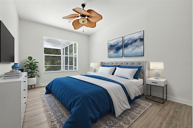 5390 Greystone Dr, Spring Hill, FL 34609 - bedroom featuring light wood-style flooring and ceiling fan