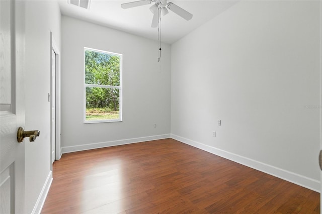 5390 Greystone Dr, Spring Hill, FL 34609 - empty room with wood finished floors and ceiling fan