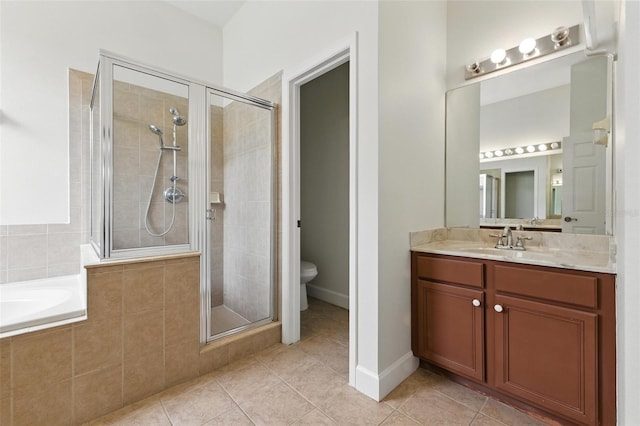 5390 Greystone Dr, Spring Hill, FL 34609 - bathroom with a shower stall, tile patterned floors, vanity, and a garden tub