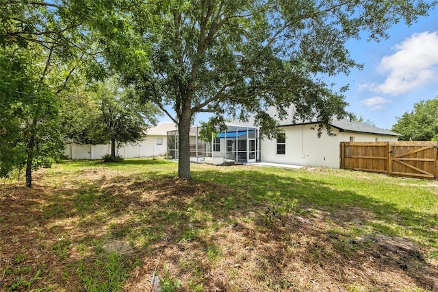 5390 Greystone Dr, Spring Hill, FL 34609 - fenced backyard featuring a gate