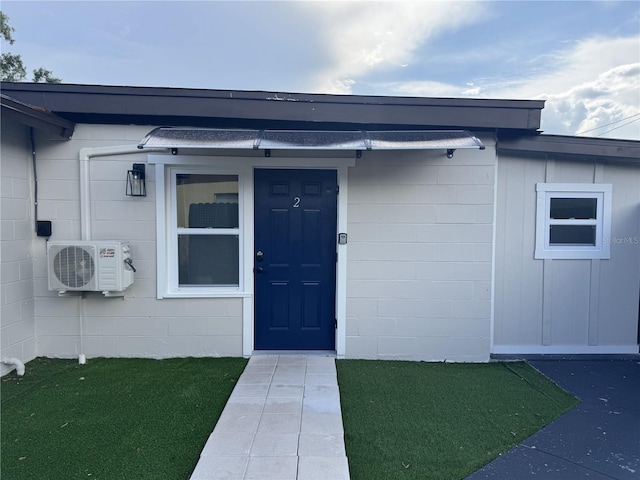 2509 Thornbrook Pl, Tampa, FL 33618 - entrance to property with concrete block siding
