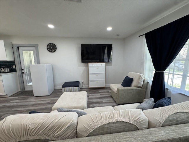 2509 Thornbrook Pl, Tampa, FL 33618 - living area with recessed lighting and wood finished floors