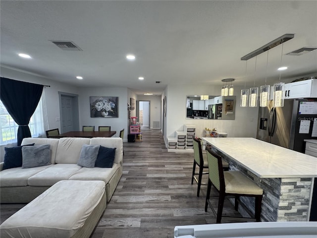 2509 Thornbrook Pl, Tampa, FL 33618 - living area featuring dark wood finished floors and recessed lighting