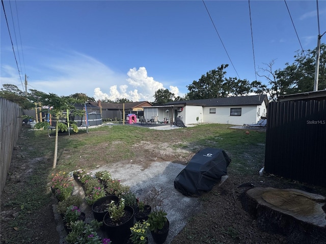 2509 Thornbrook Pl, Tampa, FL 33618 - fenced backyard featuring a patio