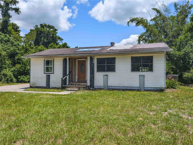 12704 Lacey, New Port Richey, FL 34654 - ranch-style house featuring a front yard