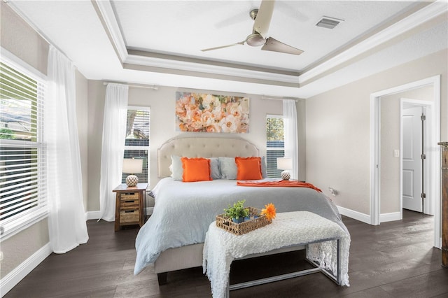 12333 Harris Hawk Rd, Weeki Wachee, FL 34614 - bedroom with a raised ceiling, multiple windows, ornamental molding, and wood finished floors