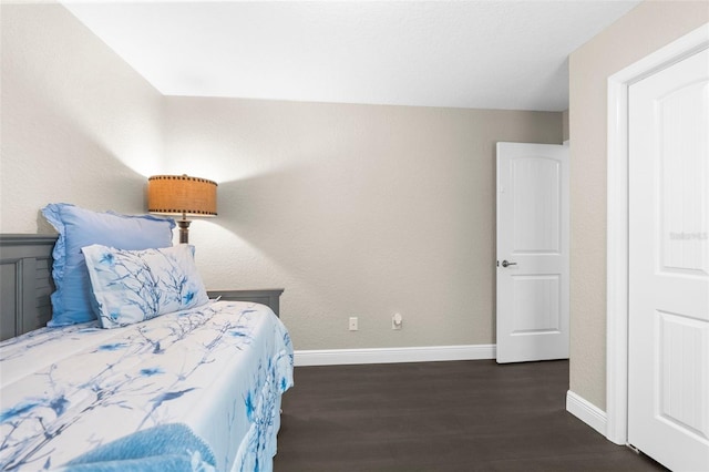 12333 Harris Hawk Rd, Weeki Wachee, FL 34614 - bedroom with wood finished floors and baseboards