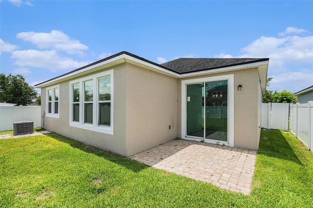 12322 Eagle Swoop Pl, Riverview, FL 33579 - rear view of property with stucco siding, a patio, and a fenced backyard