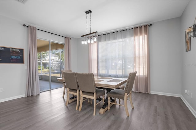 3921 SW 51st Ter, Ocala, FL 34474 - dining room with wood finished floors and baseboards