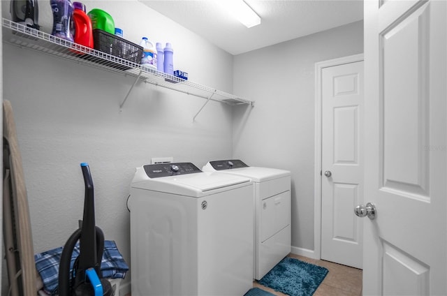 3921 SW 51st Ter, Ocala, FL 34474 - laundry room with independent washer and dryer and light tile patterned floors