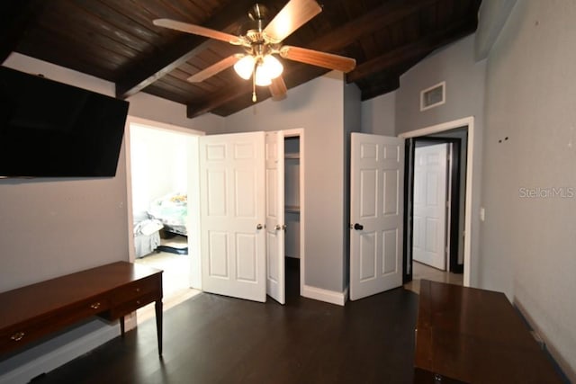 21921 US Highway 98, Dade City, FL 33523 - unfurnished bedroom with wood ceiling, dark wood finished floors, and a ceiling fan