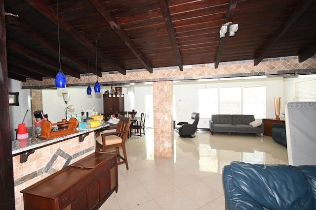 21921 US Highway 98, Dade City, FL 33523 - living room with a wooden ceiling with exposed beams and light tile patterned floors