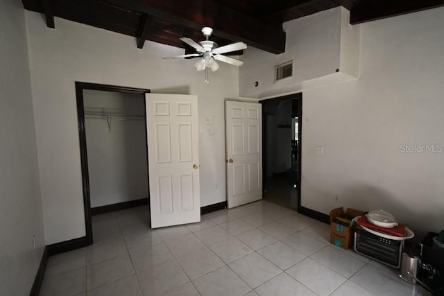 21921 US Highway 98, Dade City, FL 33523 - unfurnished bedroom with light tile patterned flooring, a closet, and wooden ceiling