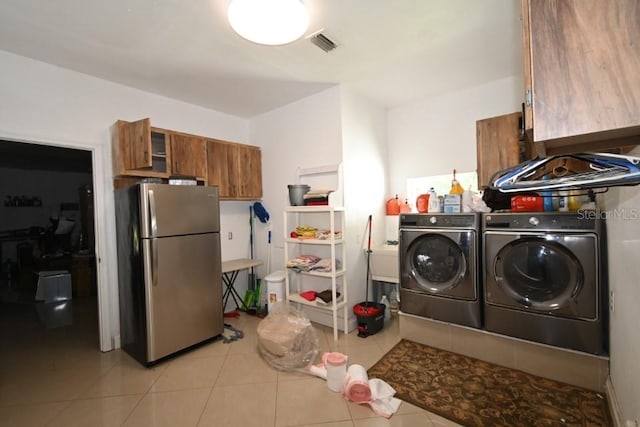 21921 US Highway 98, Dade City, FL 33523 - laundry room featuring separate washer and dryer and light tile patterned floors