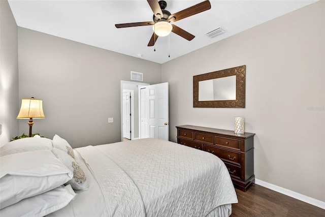 19028 Narimore Dr, Land O Lakes, FL 34638 - bedroom featuring dark wood-style floors and ceiling fan