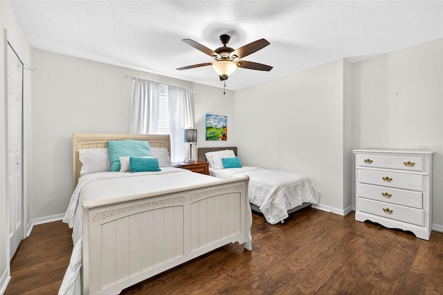 19028 Narimore Dr, Land O Lakes, FL 34638 - bedroom featuring dark wood finished floors and ceiling fan