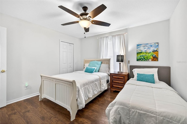 19028 Narimore Dr, Land O Lakes, FL 34638 - bedroom featuring dark wood-type flooring, a closet, and ceiling fan