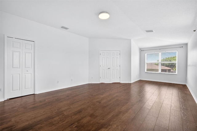19028 Narimore Dr, Land O Lakes, FL 34638 - unfurnished room with dark wood-type flooring and baseboards
