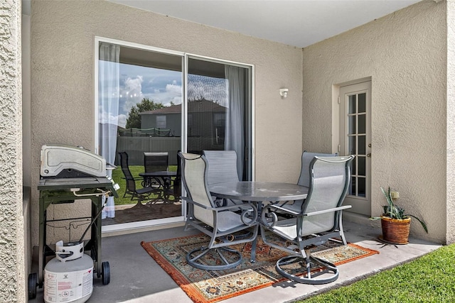 19028 Narimore Dr, Land O Lakes, FL 34638 - view of patio / terrace with outdoor dining space and grilling area