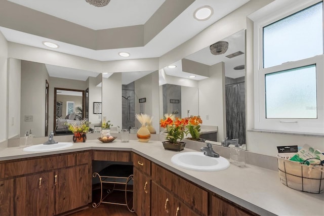2174 Kent Ave, Clearwater, FL 33764 - bathroom with a shower with curtain, double vanity, recessed lighting, ensuite bath, and wood finished floors