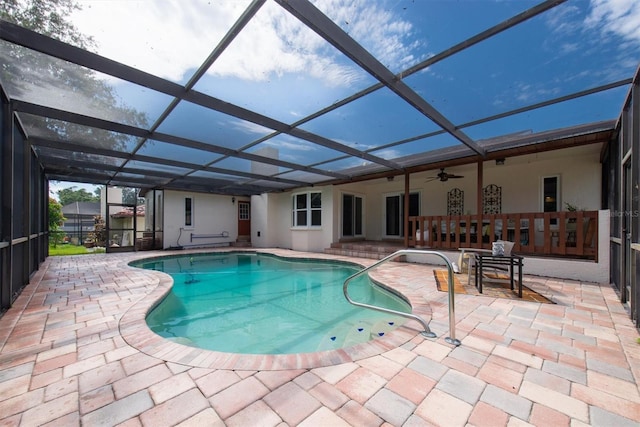 2174 Kent Ave, Clearwater, FL 33764 - swimming pool with a patio, a ceiling fan, and a lanai