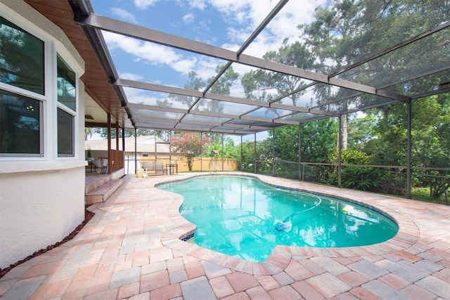 2174 Kent Ave, Clearwater, FL 33764 - view of swimming pool with a patio, a fenced backyard, and a lanai
