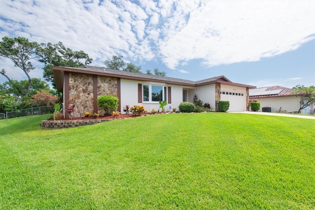 2174 Kent Ave, Clearwater, FL 33764 - view of front facade with an attached garage, driveway, stone siding, and stucco siding