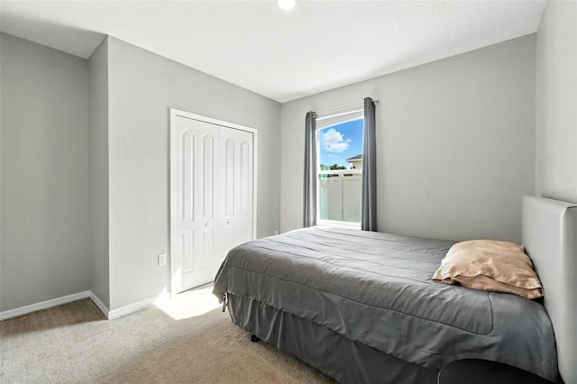 303 Briarbrook Ln, Haines City, FL 33844 - carpeted bedroom with a closet and baseboards