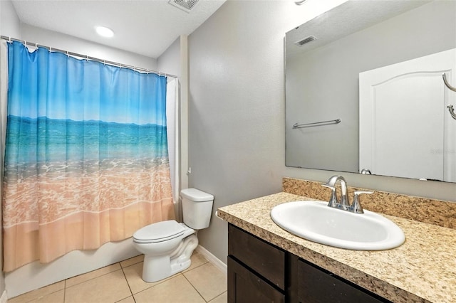 303 Briarbrook Ln, Haines City, FL 33844 - full bathroom with vanity, tile patterned floors, and shower / tub combo with curtain