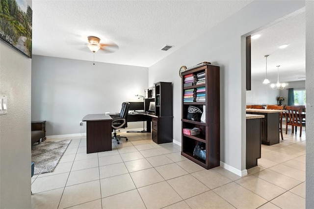 303 Briarbrook Ln, Haines City, FL 33844 - office featuring a ceiling fan, a textured ceiling, light tile patterned floors, and a chandelier