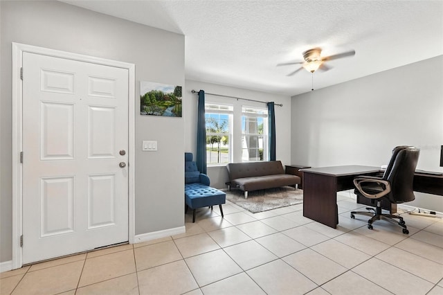 303 Briarbrook Ln, Haines City, FL 33844 - home office with a ceiling fan, a textured ceiling, and light tile patterned flooring