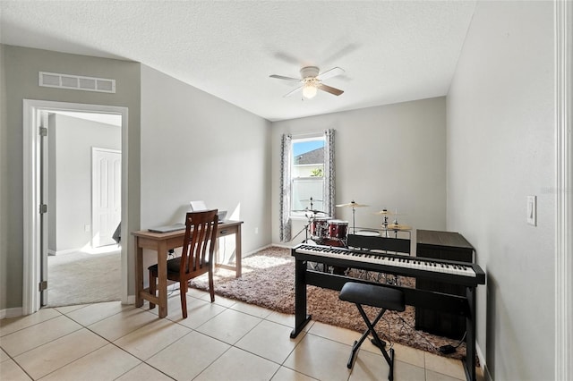 303 Briarbrook Ln, Haines City, FL 33844 - sitting room featuring ceiling fan, a textured ceiling, and light tile patterned flooring