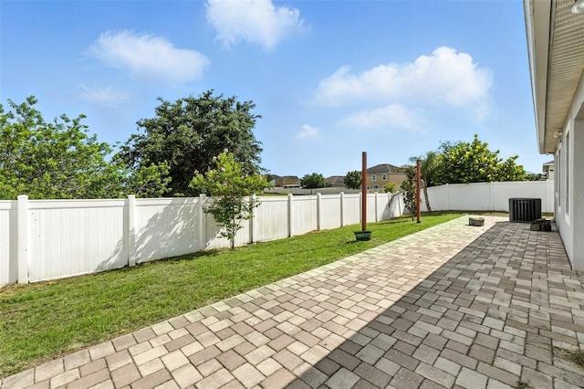 303 Briarbrook Ln, Haines City, FL 33844 - fenced backyard with a patio
