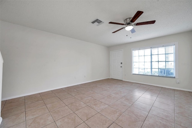 1302 Twilridge Pl, Brandon, FL 33511 - unfurnished room with ceiling fan, a textured ceiling, and light tile patterned floors