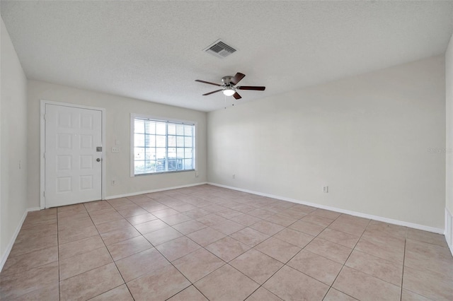 1302 Twilridge Pl, Brandon, FL 33511 - empty room with a ceiling fan, light tile patterned floors, and a textured ceiling