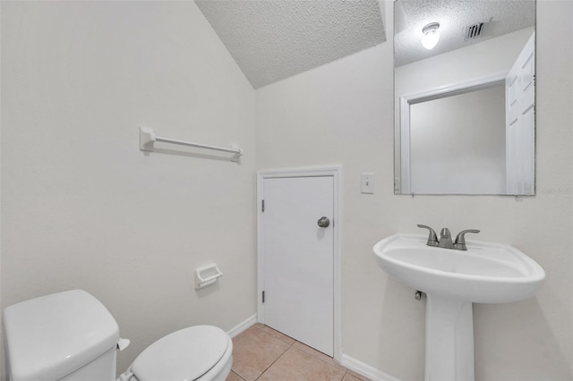 1302 Twilridge Pl, Brandon, FL 33511 - bathroom with tile patterned flooring and a textured ceiling