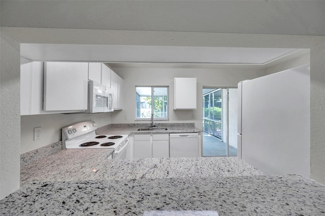 1302 Twilridge Pl, Brandon, FL 33511 - kitchen featuring white appliances and white cabinets