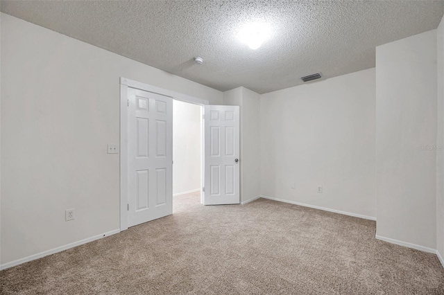 1302 Twilridge Pl, Brandon, FL 33511 - unfurnished bedroom with a textured ceiling and carpet floors