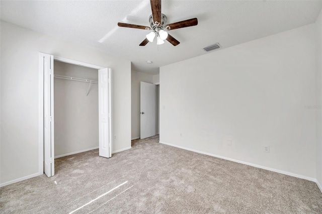 1302 Twilridge Pl, Brandon, FL 33511 - unfurnished bedroom featuring carpet flooring, a closet, and a ceiling fan