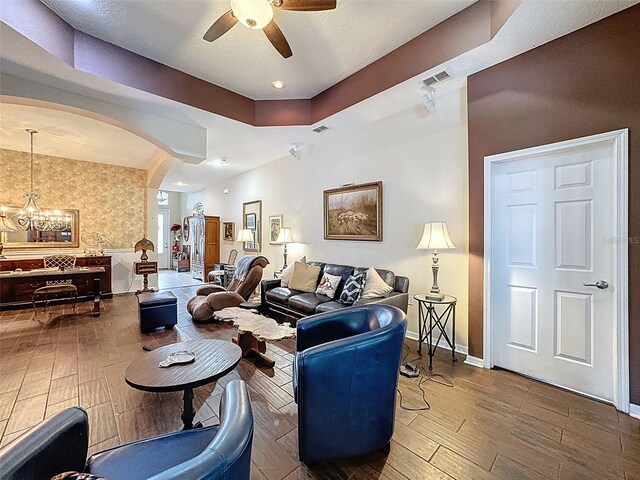 12200 Hunters Lake Dr, New Port Richey, FL 34654 - living room with a ceiling fan, a chandelier, hardwood / wood-style floors, arched walkways, and recessed lighting
