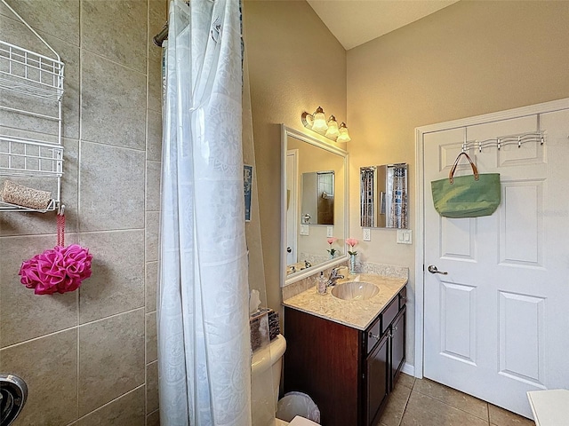 12200 Hunters Lake Dr, New Port Richey, FL 34654 - bathroom featuring tile patterned flooring, vanity, a tile shower, and radiator