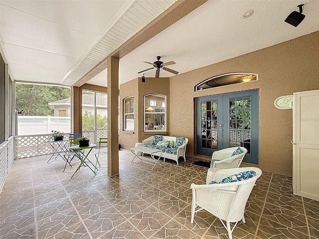 12200 Hunters Lake Dr, New Port Richey, FL 34654 - view of patio / terrace featuring french doors and ceiling fan