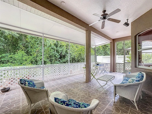 12200 Hunters Lake Dr, New Port Richey, FL 34654 - sunroom featuring ceiling fan