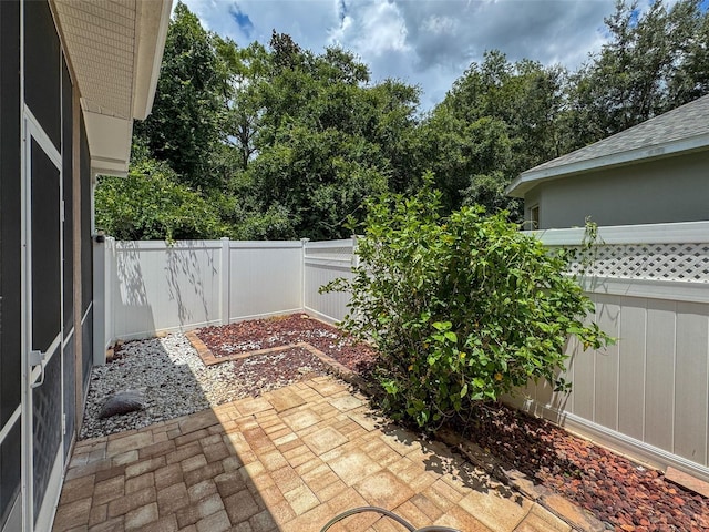 12200 Hunters Lake Dr, New Port Richey, FL 34654 - fenced backyard featuring a patio area