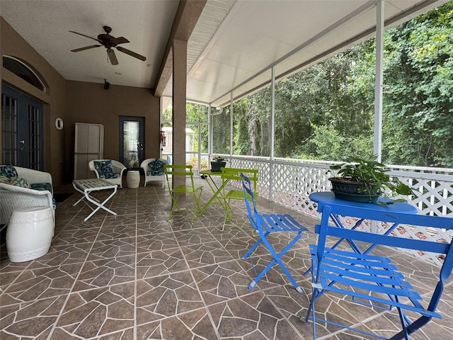 12200 Hunters Lake Dr, New Port Richey, FL 34654 - sunroom / solarium featuring a ceiling fan
